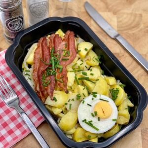 Tiroler Gröstl (aardappel, ui, spek, champignons, ei)