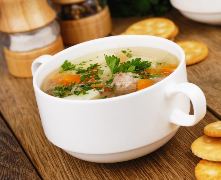 Homemade,Soup,With,Meatballs,On,The,Kitchen,Table